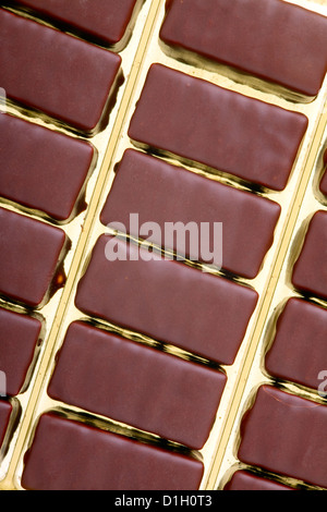 Close up of a chocolates cream-filled in a plastic box Stock Photo