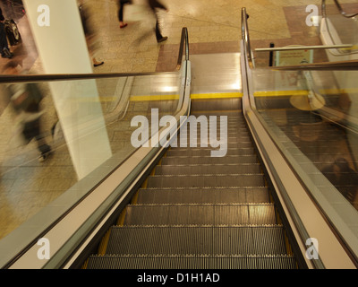 December 2012 - Looking down an empty moving escalator Stock Photo