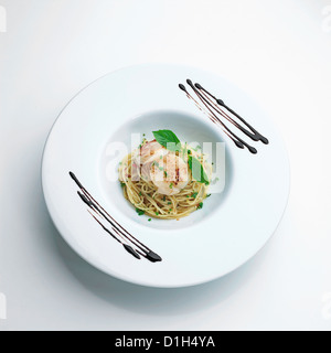 Fried spaghetti seafood menu with scallops Stock Photo