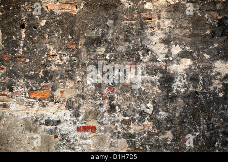 Peeling paint brick wall background texture Stock Photo