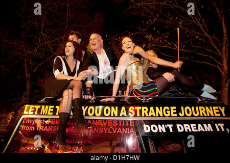 Brighton, UK. Friday 21st December 2012. Theatre cast from the Rocky Horror Show join in with the festivities. Burning the Clocks has been a Brighton tradition for almost two decades. This event takes place on the winter solstice, the shortest day of the year. A 2,000-strong parade winds its way through the streets and people pass their handmade paper and willow lanterns – filled symbolically with their hopes and dreams – into a blazing bonfire to “burn the clocks” and welcome in the new longer day. Stock Photo