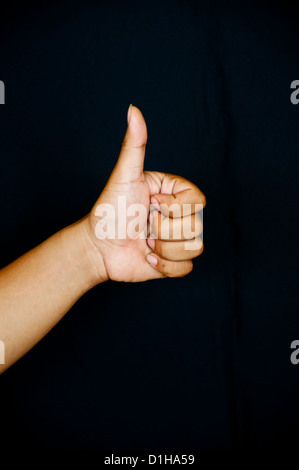 thumb up sign for good Stock Photo