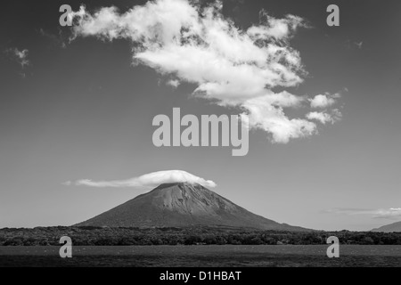 Black and white photo of approach to volcano Conception on Ometepe Island, in lake Nicaragua from the water, Central America. Stock Photo