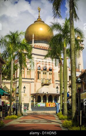 Dec. 21, 2012 - Singapore, Singapore - Exterior of the Sultan Mosque in Singapore. The Sultan Mosque is the focal point of the historic Kampong Glam area of Singapore. Also known as Masjid Sultan, it was named for Sultan Hussein Shah. The mosque was originally built in the 1820s. The original structure was demolished in 1924 to make way for the current building, which was completed in 1928. The mosque holds great significance for the Muslim community, and is considered the national mosque of Singapore. It was designated a national monument in 1975. (Credit Image: © Jack Kurtz/ZUMAPRESS.com) Stock Photo