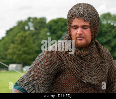 Man dressed in Chain Link Medieval Armour, Chainmail Links. View from the front. Close up Stock Photo