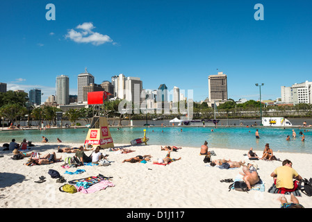 BRISBANE, Australia - The artificial beach at South Bank across the Brisbane River from the CBD of Brisbane, the Queensland capital. Stock Photo