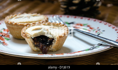 Christmas Mince Pies on an old fashioned china plate Stock Photo