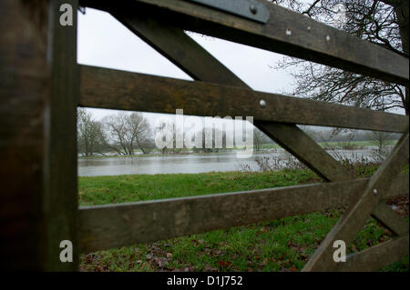 Lacock, Wiltshire, UK. 24th Dec, 2012. Flooded fields next to the River Avon, Lacock, Wiltshire after the river burst its banks due to heavy rainfall. Stock Photo