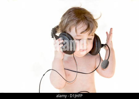 Little boy, less one with headphones Stock Photo