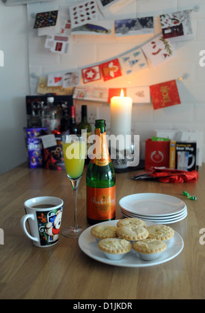 Christmas mince pies with a glass of bucks fizz Stock Photo