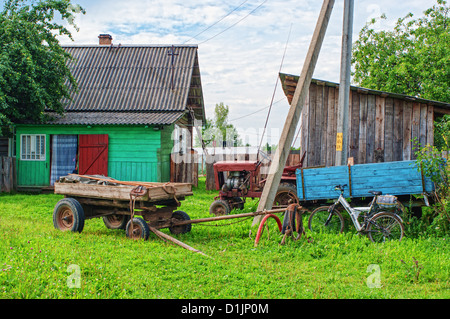 Rural transport near village house. Stock Photo