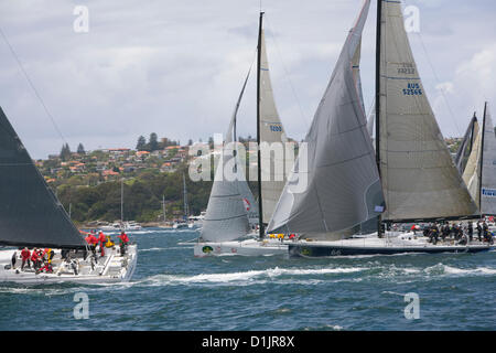 Sydney, Australia. 26th December 2012. rolex sydney to hobart yacht race 2012, race has just begun in sydney harbour, boats are progressing towards the heads Stock Photo