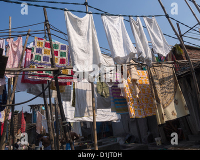Clothes hanging to dry at Dhobi Ghat an outdoor laundry facility in Mumbai India. Stock Photo