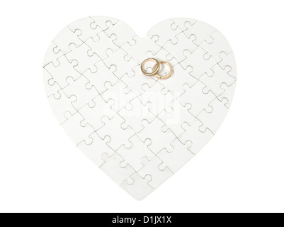 heart made from the puzzle on white Stock Photo