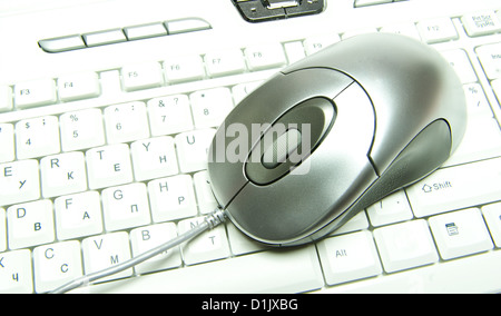 computer mouse on white computer keyboard Stock Photo