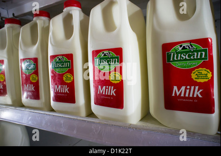 Containers of milk in a supermarket refrigerator in New York Stock Photo -  Alamy