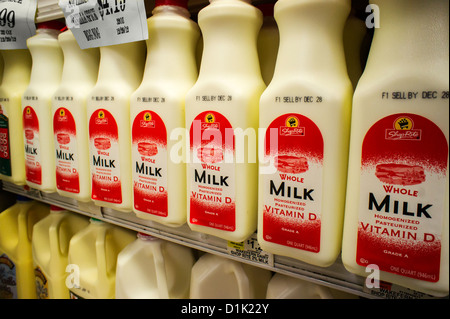 Containers of milk in a supermarket refrigerator in New York Stock Photo -  Alamy