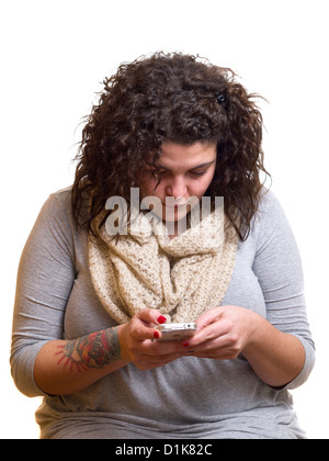 Woman texting on white iPhone Stock Photo
