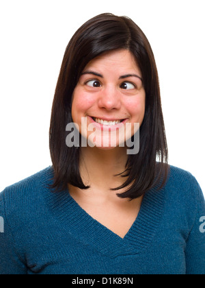 Portrait of young woman doing funny face over white background Stock Photo