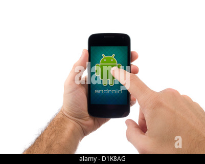 Hands holding and using an Android smartphone Stock Photo