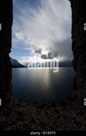 View over Lake Geneva bordered by stone taken from Chateau de Chillon (Chillon Castle) Stock Photo