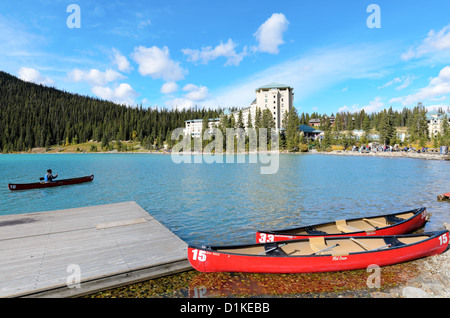 Lake Louise, Canada - September 29th, 2012: Canoes in front of The Fairmont Chateau Lake Louise in Banff National Park Canada Stock Photo