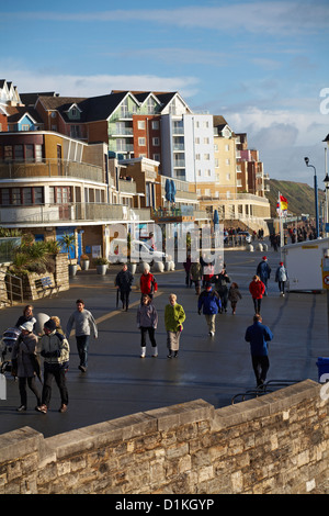 crowds walk along the seafront at The Overstrand Boscombe on Christmas day