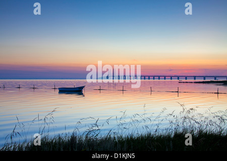 Öresund / Øresund Bridge, railway and dual carriageway bridge-tunnel between Denmark and Sweden at sunset, Scandinavia Stock Photo