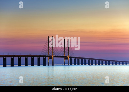 Öresund / Øresund Bridge, railway and dual carriageway bridge-tunnel between Denmark and Sweden at sunset, Scandinavia Stock Photo