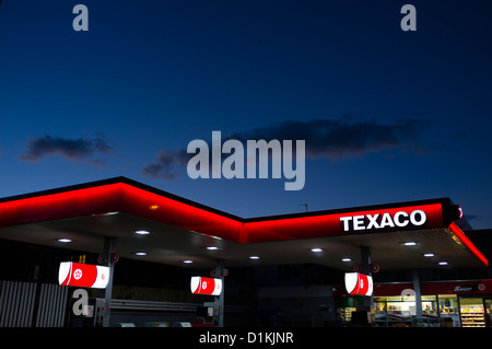 The forecourt of a Texaco petrol station garage at night Aberystwyth Wales UK Stock Photo