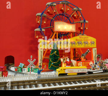 Dec. 26, 2012 - Garden City, New York, U.S. - The Long Island Garden Railway Society large-scale model train display is a festive winter holiday attraction in the vast 3-floor atrium of Cradle of Aviation museum. This is a ferris wheel in the colorful circus themed part of the display. LIGRS shares the knowledge, fun, and camaraderie of large-scale railroading both indoors and in the garden, and is family oriented. Stock Photo