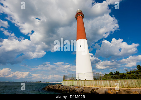 Barnegat Lighthouse or Barnegat Light, colloquially known as 'Old Barney', is a historic lighthouse located in Long Beach Island Stock Photo