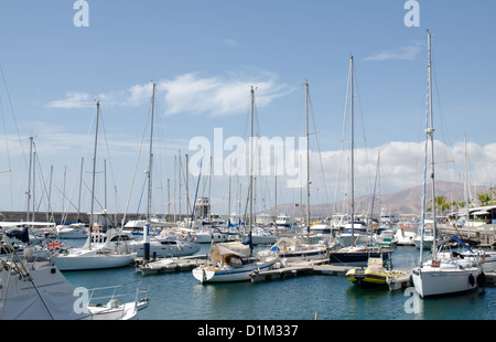 Yachts boats moored in Puerto Calero Canary Islands Stock Photo