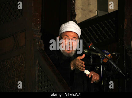 Dec. 28, 2012 - Cairo, Cairo, Egypt - Egyptian cleric Sheikh Yusuf al-Qaradawi, chairman of the International Union of Muslim Scholars, leads Friday prayers  before a protest against Syrian President Bashar al-Assad, at Al Azhar mosque in old Cairo December 28, 2012  (Credit Image: © Ashraf Amra/APA Images/ZUMAPRESS.com) Stock Photo