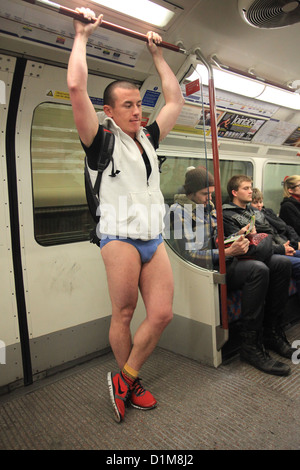 Participant of 'No Trousers on Tube Ride' flashmob, London Stock Photo