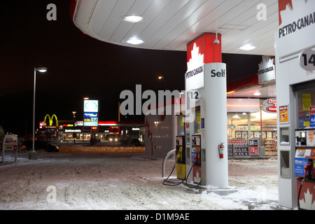 petro canada winter gas fuel pump at service station Regina Saskatchewan Canada Stock Photo