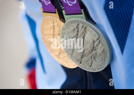 Gold and silver medals won by Olympian sportsmen at the 2012 London Olympics. Stock Photo