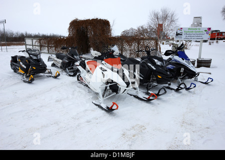 snowmobiles parked in Kamsack Saskatchewan Canada Stock Photo
