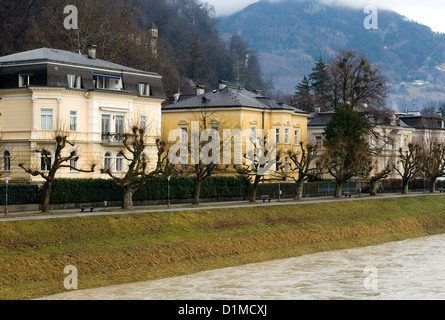 Large luxury homes beside the Salzach River, Salzburg, Austria Stock Photo