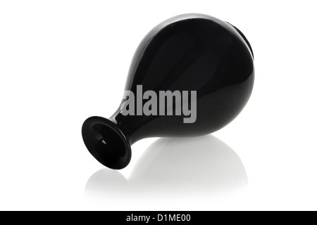 Chinese Black Ceramic Wine Bottle Lying on White Background Stock Photo