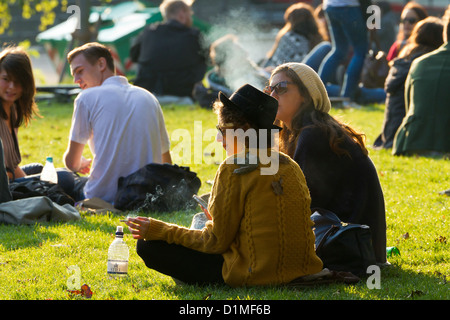 People relaxing in the Monbijou Park in Berlin, Germany Stock Photo