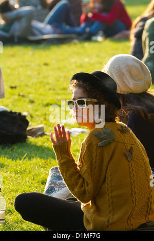 People relaxing in the Monbijou Park in Berlin, Germany Stock Photo