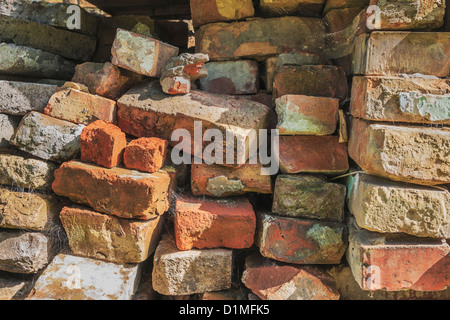 Viele Ziegelsteine übereinander gestapelt | Many bricks stacked Stock Photo