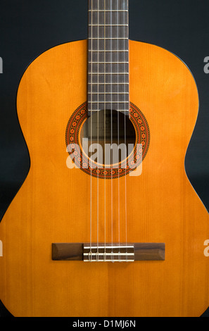 A Spanish style acoustic six string guitar Stock Photo