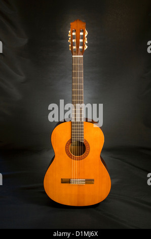 A Spanish style acoustic six string guitar Stock Photo