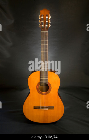 A Spanish style acoustic six string guitar Stock Photo