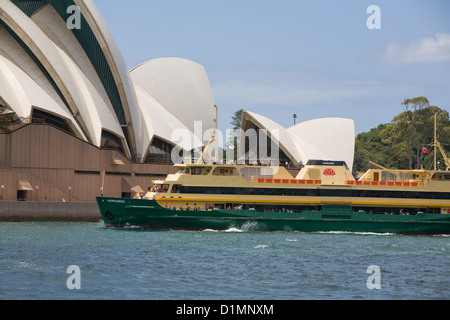 Sydney ferry MV Narrabeen passing the Sydney Opera House on Sydney Harbour,New South Wales,Australia Stock Photo