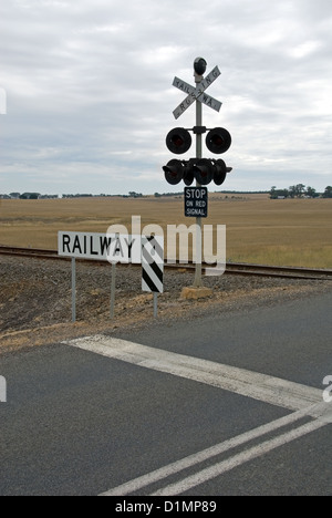 Level crossing lights, on a lonely country road in North-Western Victoria, Australia Stock Photo