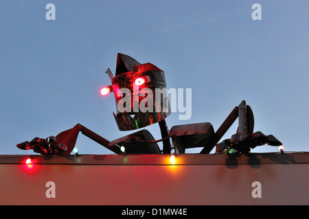 Robot towering from a building roof in Goshen Indiana USA Stock Photo