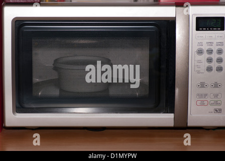 Vegetables Cooking In A Microwave Oven Stock Photo